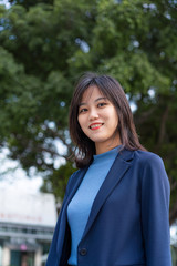 Young business women smile to the camera
