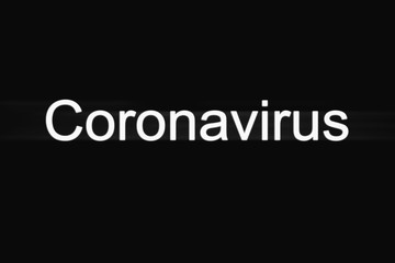 Simple coronavirus quarantine concept. The inscription coronavirus on a black background, in white letters.