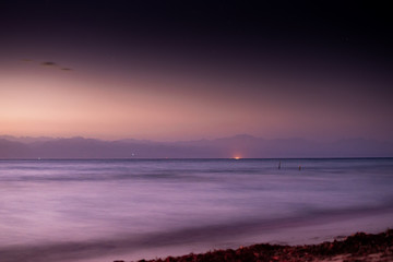 Fototapeta na wymiar Purple dawn on the Red Sea off the coast of Nuweiba, Egypt
