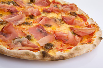 Flatlay of Italian pizza on white background. Rustic homemade pizzas with salami, bacon,  cheese, eggs and raw vegetables on shabby wooden background. Healthy vegetarian fungi pizza