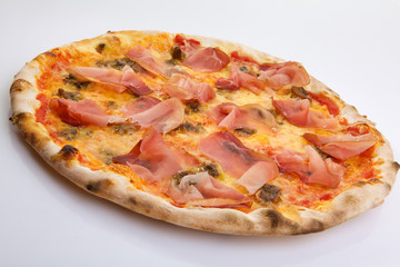 Flatlay of Italian pizza on white background. Rustic homemade pizzas with salami, bacon,  cheese, eggs and raw vegetables on shabby wooden background. Healthy vegetarian fungi pizza
