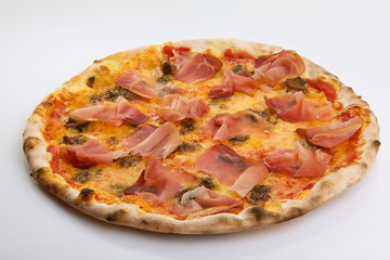 Flatlay of Italian pizza on white background. Rustic homemade pizzas with salami, bacon,  cheese, eggs and raw vegetables on shabby wooden background. Healthy vegetarian fungi pizza