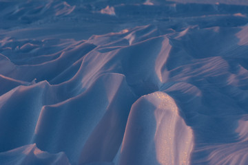wind blown icy snow drifts in churchill manitoba