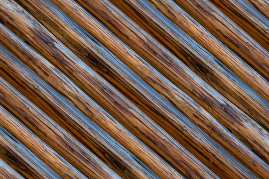 wooden background ribbed brown oblique stripes parallel base dark