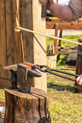 work blacksmith forging metal heated red street forge vertical photo