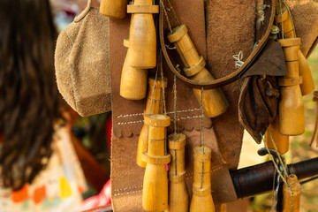 base leather belt powder flask wooden background army copy space