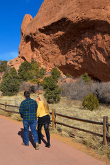 Man and women hike in garden of the Gods
