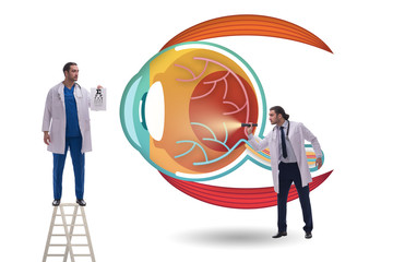 Doctor examining giant eye in medical concept