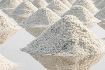 Fototapeta na wymiar A lot of table salt in the salt fields of Thailand.