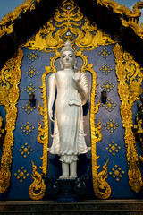 Beautiful White Buddha In a temple of Thailand