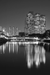 High rise residential building and mountain in Hong Kong city at night