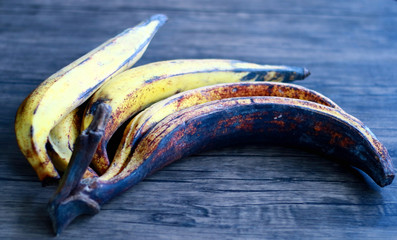 Cooking banana on wood background. 