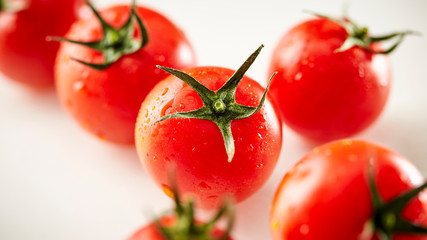 fresh tomatoes on white background