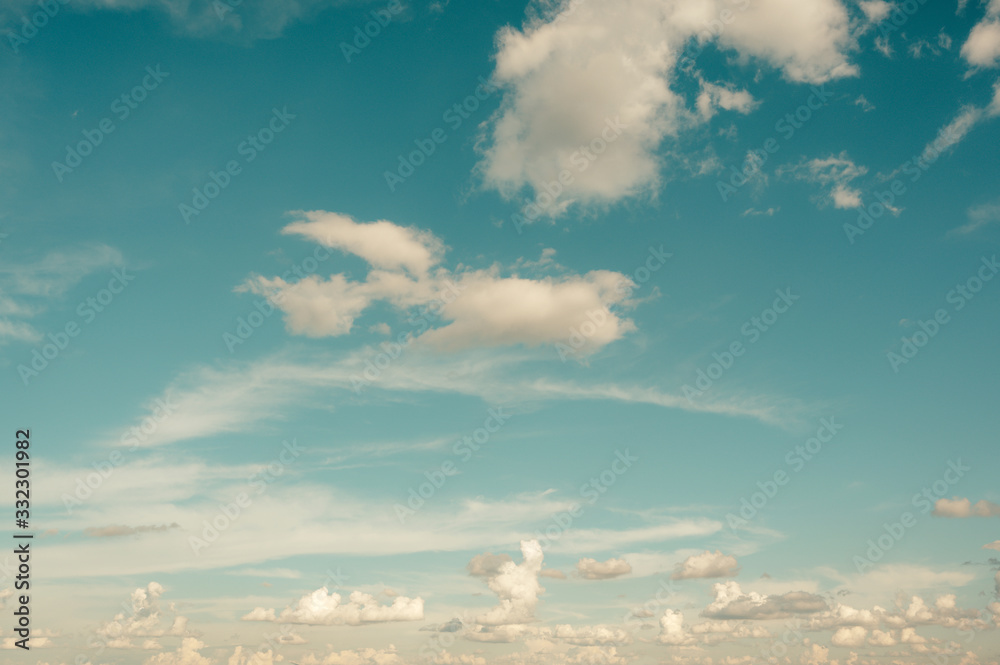Wall mural nature of cloudscape in summer. environment and weather background. vintage color tone effect.