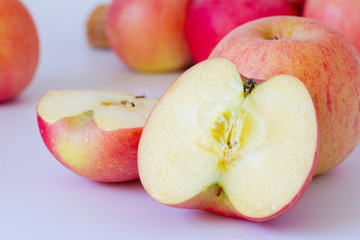 Gala apple halves isolated on white background
