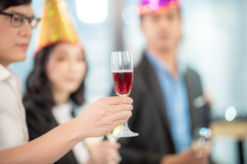 Business people drink wine At a party celebrating business success