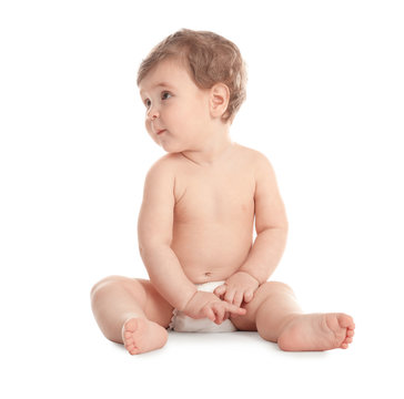 Cute little baby in diaper on white background