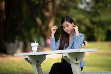 Naklejka premium A business woman with a desk in the morning