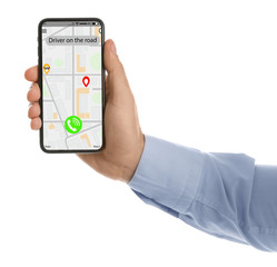 Man ordering taxi with smartphone on white background, closeup