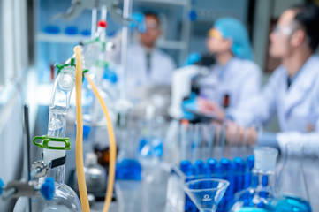 Researcher team and the development of antiretroviral drugs in a chemical laboratory