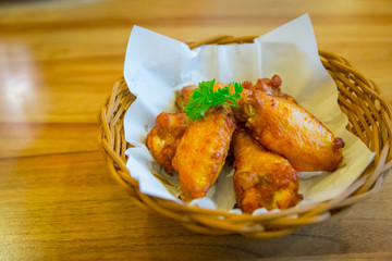 Chicken wings barbecued in a basket