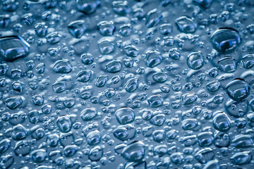Water droplets on blue