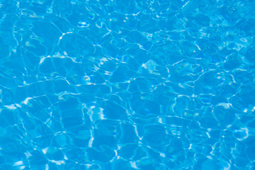 Blue water ripple reflection in the swimming pool