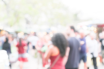 Blur of people and environment at weekend market