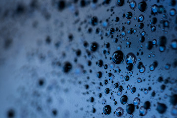 Water droplets on blue
