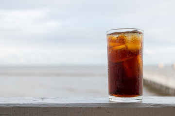 Cola with ice in the glass ready to drink for refresh