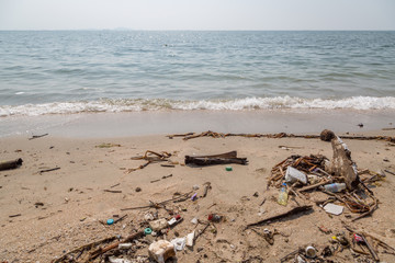 Plastic junk garbage dirty on the beach environment pollution