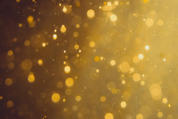 Dark Abstract Gold bokeh sparkle on black