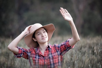 young farmer girl relaxing in barley rice