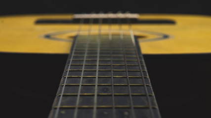 Acoustic guitar close up. musical instrument. strings on the guitar neck