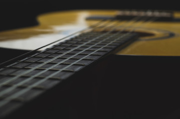 Acoustic guitar close up. musical instrument. strings on the guitar neck