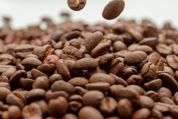 coffee beans close up on a white isolated background,copy space.