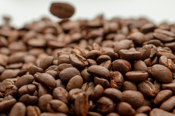 coffee beans close up on a white isolated background,copy space.