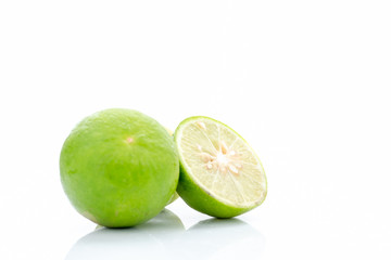 Fresh green lemon fruit isolated on white background.