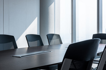 Modern office meeting room table and chairs