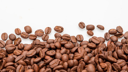 coffee beans close up on a white isolated background,copy space.