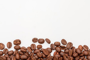 coffee beans close up on a white isolated background,copy space.