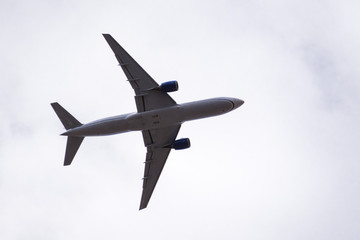 Low angle view of Commercial airplane in mid flight;