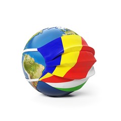 Earth Globe in a medical mask with flag of Seychelles Seychellois isolated on white background. Global epidemic of Chinese coronavirus concept.
