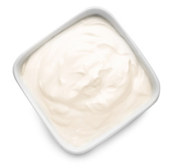 Bowl with tasty sour cream on white background