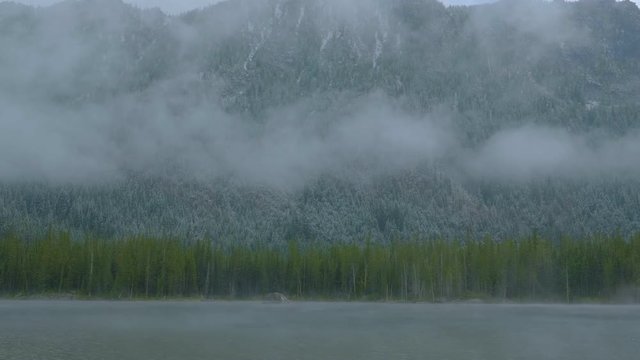 Low Lying Clouds Across The Mountains At Lake In Cascade Range In Western North America -wide shot
