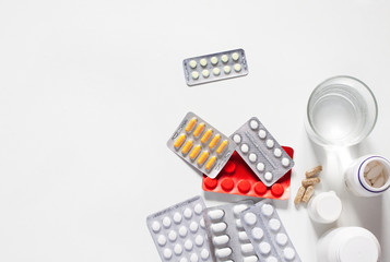 tablets and capsules for the treatment of colds and viral diseases. the fight against viruses. white background. copy space