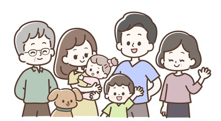 こちらを見ている三世代家族と犬