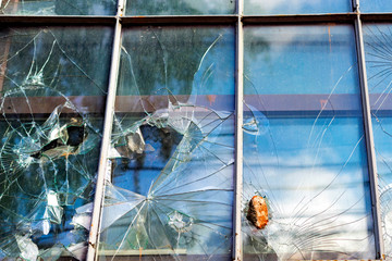 broken glass windows, showcases vandalism,