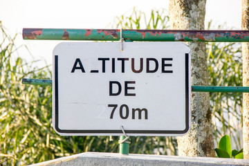 Fototapeta premium brazilian information boards with the words: altitude of 70 meters