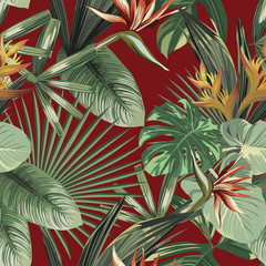Exotic flowers tropical green leaves seamless red background